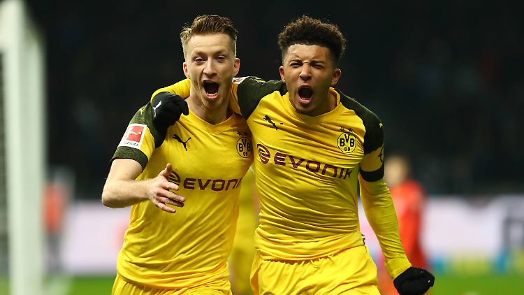 Der Matchwinner und sein Vorlagengeber: Marco Reus und Jadon Sancho im Berliner Olympiastadion.