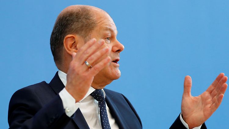 Weist alle Befürchtungen zurück: "Kein Geld für die Fusion von Deutscher Bank und Commerzbank", sagt Finanzminister Scholz.