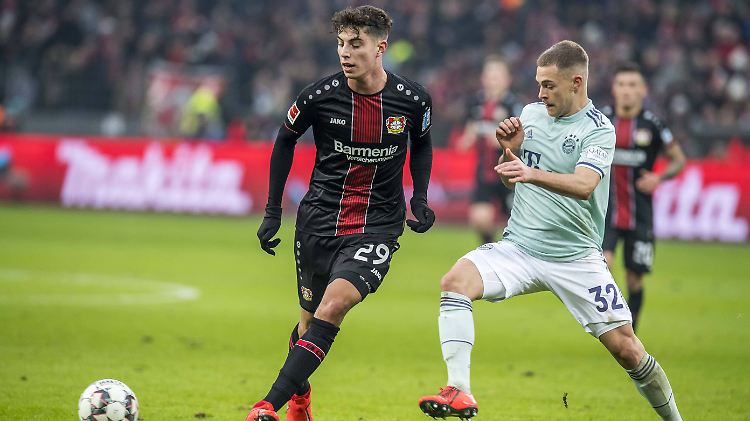 Kai Havertz (l.) und Joshua Kimmich: In der laufenden Saison noch Gegner, bald schon Teamkollegen beim FC Bayern München?