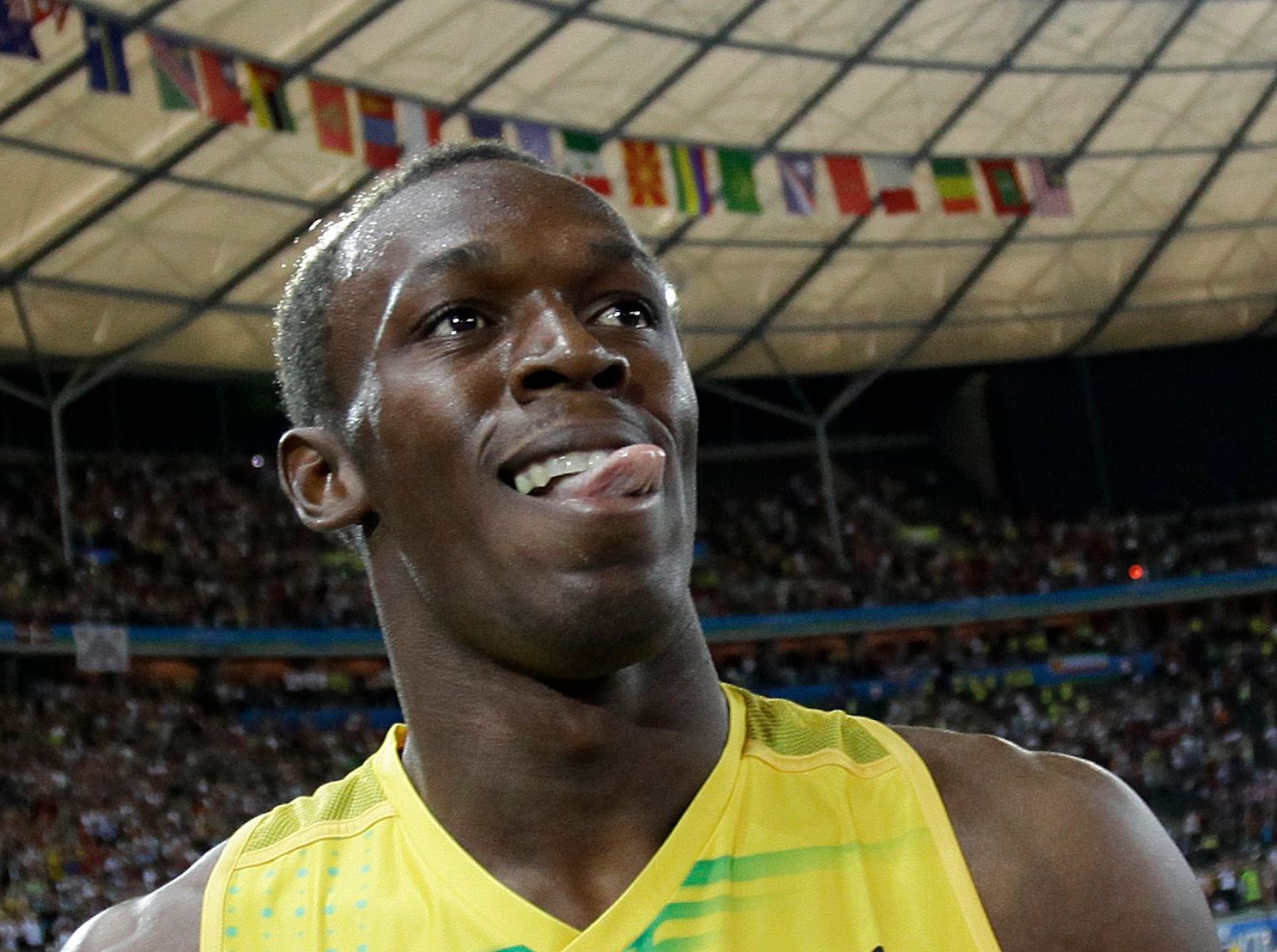 Usain Bolt lächelte schelmisch. Als wüsste er, was er der Welt da gleich zeigen würde. 