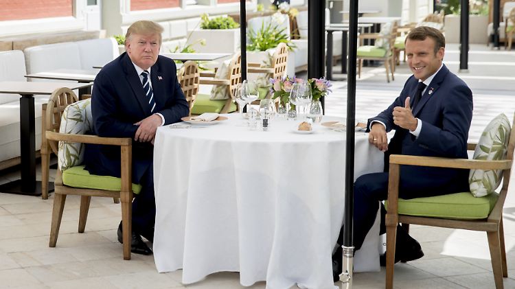 Nach Streit über Zölle für französischen Wein bittet Macron Trump zum Mittagessen. 