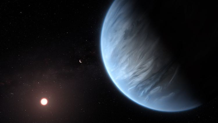 Exoplanet K2-18b mit seiner Sonne (Computergrafik): Er hat rund die achtfache Masse und mehr als den doppelten Durchmesser der Erde - und es gibt Wasser.