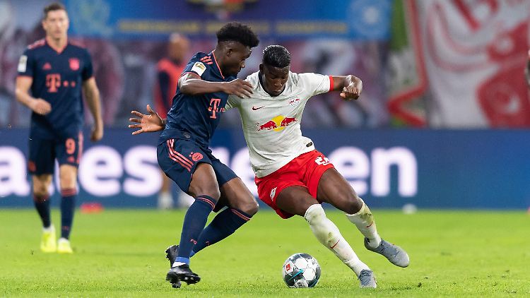 Alphonso Davies (l.) hemmte den Offensivdrang von Nordi Mukiele erfolgreich.