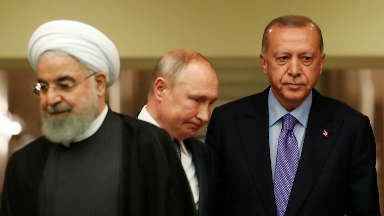 Ein Durchbruch sieht anders aus: Ruhani, Putin und Erdogan finden keine Lösung für das Bürgerkriegsland Syrien. 