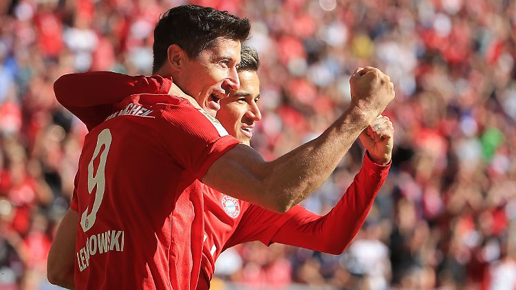 Mit Freude bei der Arbeit: Robert Lewandowski und Philippe Coutinho.