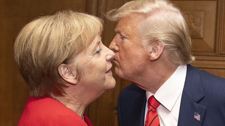Der Schein trügt: Was die Ukraine-Politik angeht, kommen Merkel und Trump auf keinen grünen Zweig.