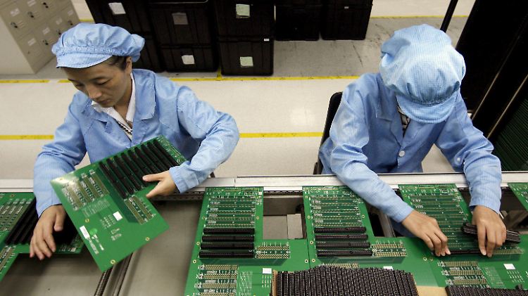 Die "Werkbank der Welt": In Städten wie Shenzhen arbeiten unzählige Wanderarbeiter, oft unter gnadenlosen Bedingungen.