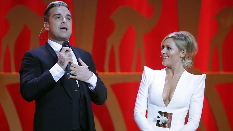 Unter anderem bei der Bambi-Verleihung 2013 sind sie sich schon mal begegnet: Robbie Williams und Helene Fischer.