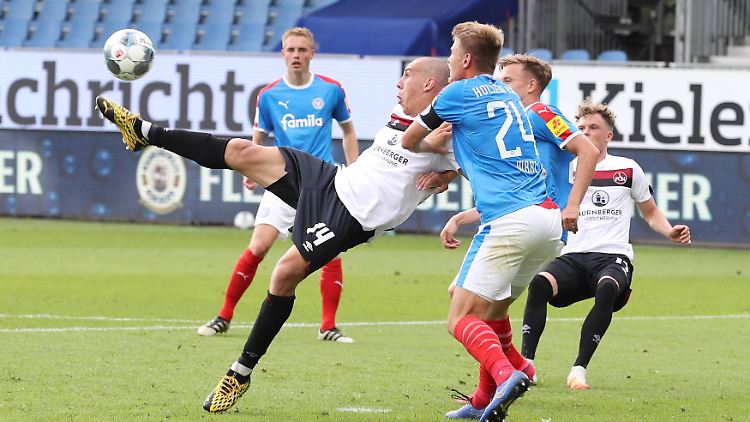 Nürnberg streckte sich in Kiel, zum Sieg reichte es nicht. Stattdessen geht die Saison für den FCN in die Verlängerung.