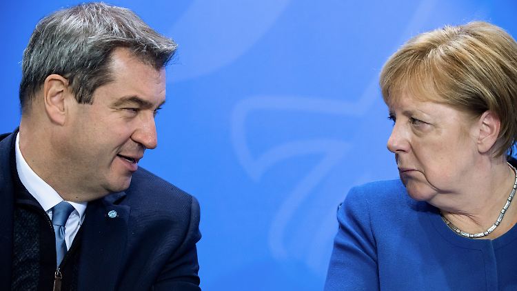 Kommen miteinander zurecht: Söder und Merkel.