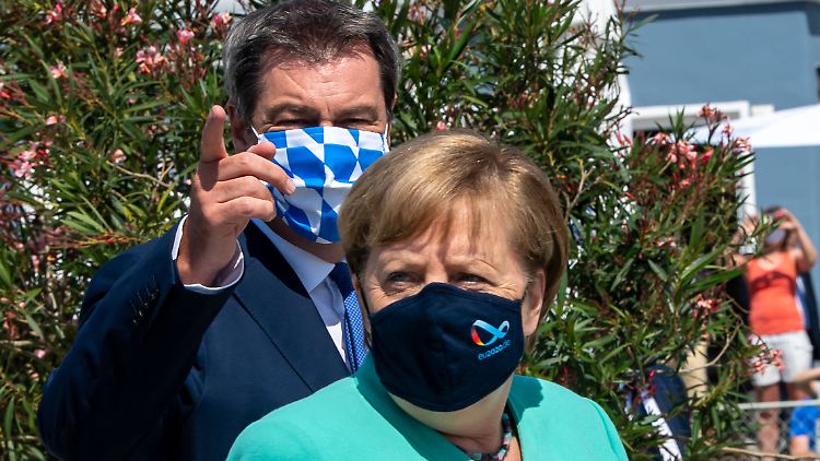 Eine Richtung? Zumindest in der Corona-Politik sind Merkel und Söder einer Meinung.