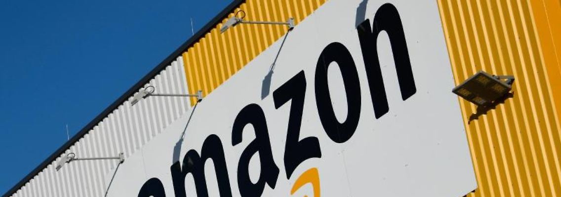 Das Logo des Online-Händlers Amazon. Foto: Ina Fassbender/dpa/Archiv