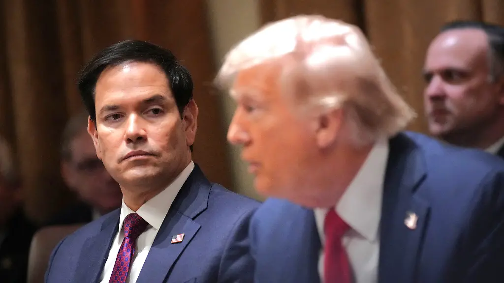 AFP-20250227-2202121504-v3-HighRes-JoinedByElonMuskTrumpHoldsFirstCabinetMeetin