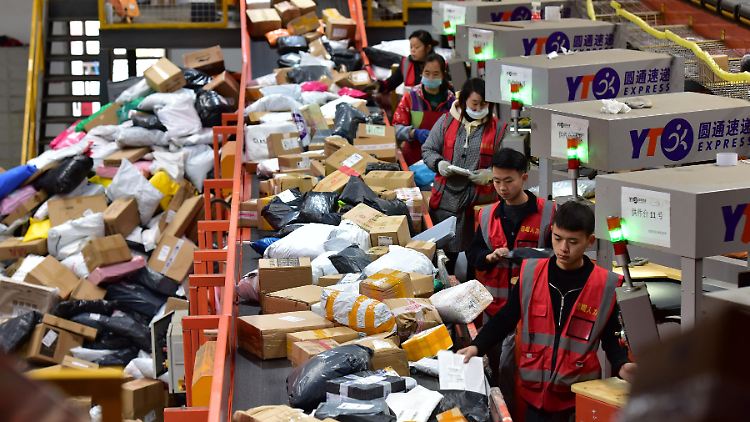 Die im Warenhandel Beschäftigten haben in China derzeit viel zu tun.