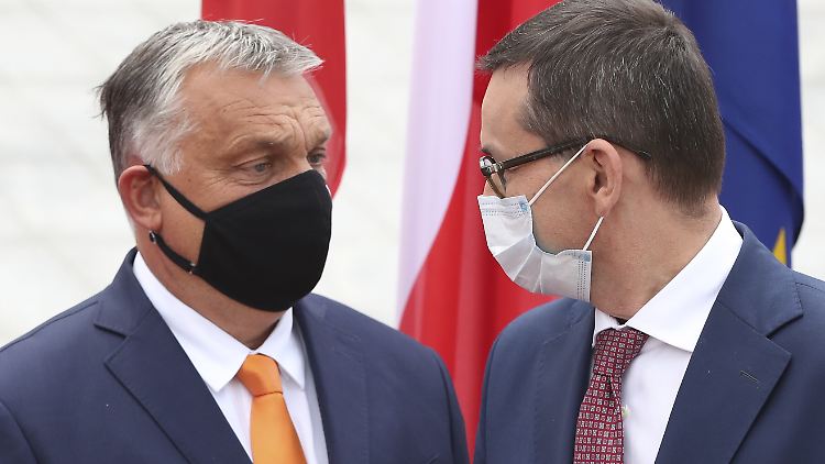 Zwei gegen den Rest der EU: Ungarns Staatschef Viktor Orban (links) und Polens Premier Mateusz Morawiecki.