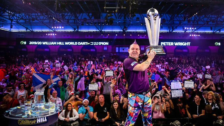 Die Party bei der Darts-WM, wie hier nach dem Sieg von Peter Wright, wird in diesem Jahr kleiner ausfallen.
