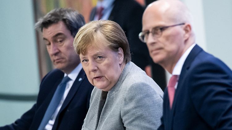 Markus Söder, Angela Merkel, Peter Tschentscher und Olaf Scholz (v.l.n.r.) werben für Vertrauen.