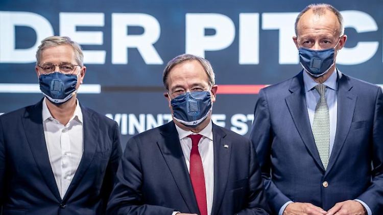 Die drei Kandidaten für den Bundesvorsitz der CDU, Armin Laschet (M), Friedrich Merz (r) und Norbert Röttgen (l).