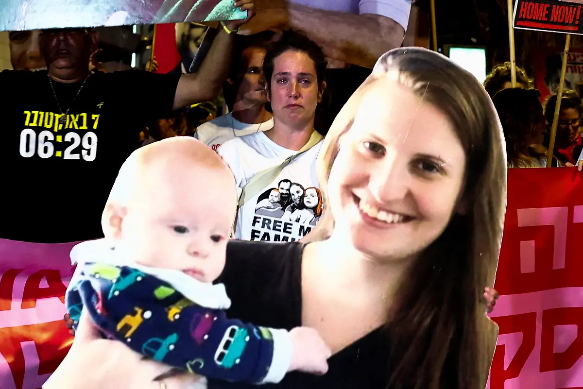 2024-10-10T180137Z-1422479437-RC2SHAAR8K0L-RTRMADP-3-ISRAEL-PALESTINIANS-HOSTAGES-MARCH