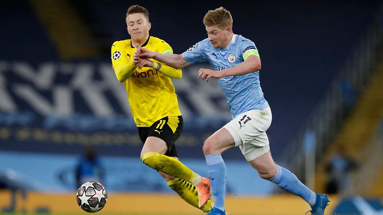 Marco Reus (links) traf zum 1:1, aber Kevin De Bruynes langer Ball kurz vor Schluss leitete den Siegtreffer für Man City ein.
