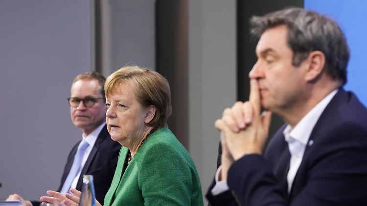 Sieht alle Länder bei der Umsetzung der Notbremse in der Pflicht: Angela Merkel.