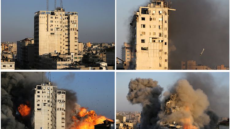 Ein Hochhaus im Gazastreifen wird durch Bombardements der israelischen Luftwaffe zum Einsturz gebracht.