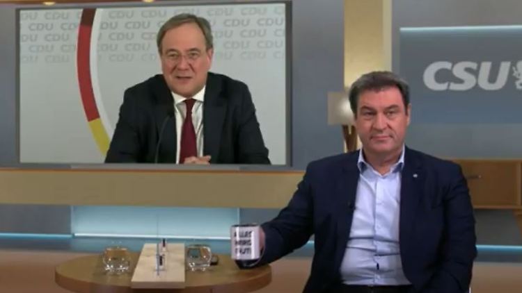 "Alles wird gut!", sagt Söders Tasse. "Liebe Grüße nach Aachen", sagt Söder.