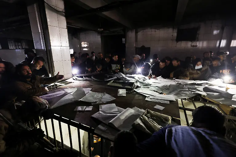 2024-12-09T134725Z-157116765-RC2LLBAKOBGY-RTRMADP-3-SYRIA-SECURITY-PRISON