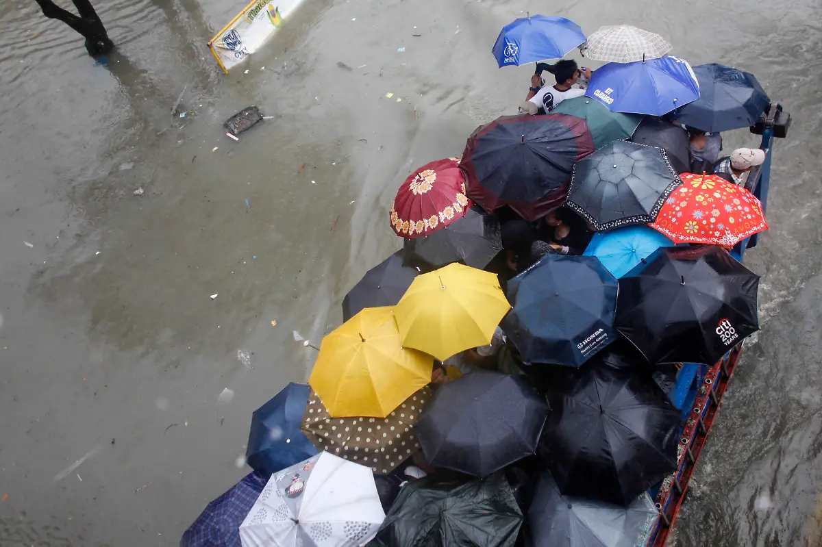 2013-08-19T120000Z-944467471-GM1E98J1HHM01-RTRMADP-3-PHILIPPINES-FLOODS