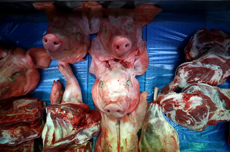 2021-11-23T081940Z-171635810-RC2FXQ9W72K8-RTRMADP-3-BRITAIN-MEAT