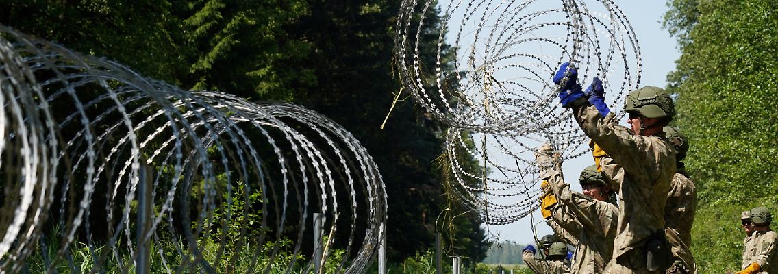 2021-08-04T143751Z_8183750_RC2EYO9KO2I1_RTRMADP_3_BELARUS-POLITICS-LITHUANIA-BORDER.JPG