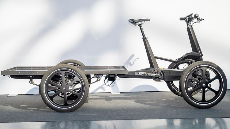 Fahrrad oder schon Kleintransporter? Modelle wie das E-Lastenrad SUM-X vom Hersteller One Less mit vier Rädern lassen den Unterschied immer kleiner werden.