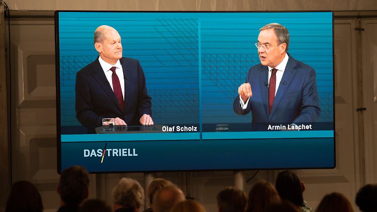 Scholz muss sich von Laschet einiges anhören.