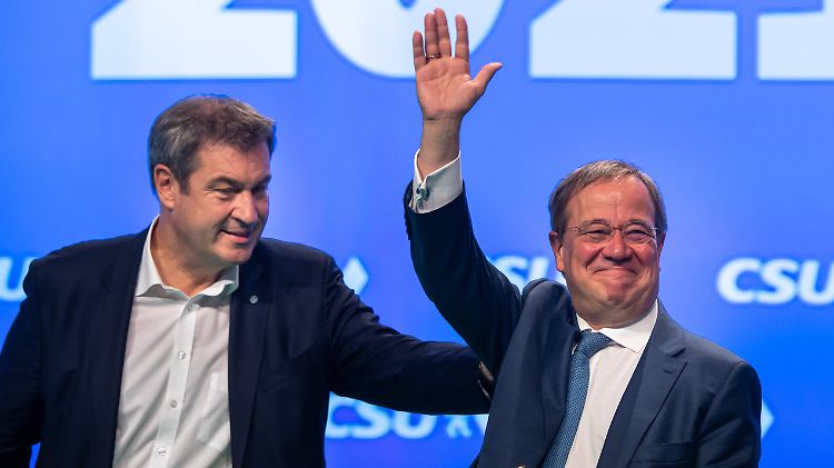 Beim CSU-Parteitag am Samstag zeigten sie sich einig: Laschet und Söder (l.).