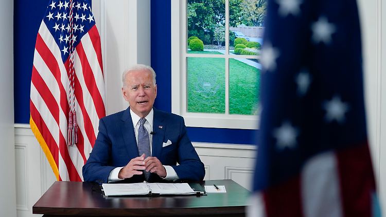 Um die Pandemie in den USA zu besiegen, "müssen wir sie überall besiegen", sagte Biden bei einem virtuellen Corona-Gipfel.
