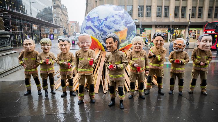 Aktivisten machen auf den Straßen Glasgows ihrem Ärger Luft.