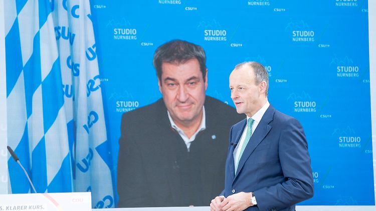 Reichen sich virtuell die Hand: Friedrich Merz und Markus Söder