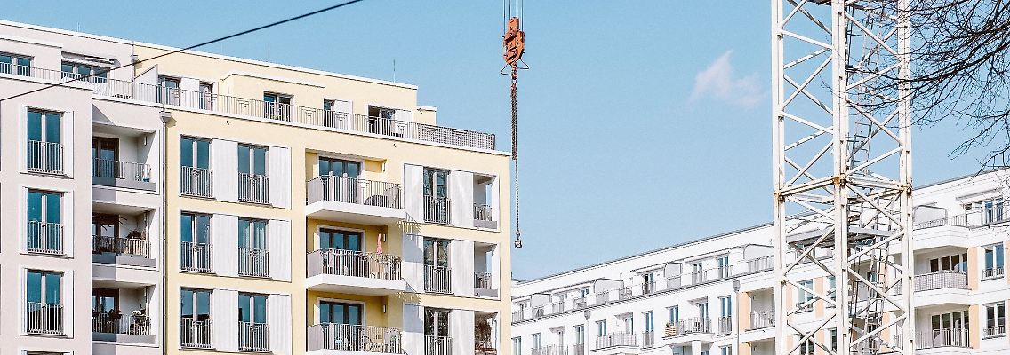 In Immobilien investieren, ohne Eigentümer zu sein: Offene Immobilienfonds bieten genau das.