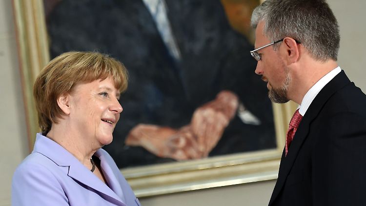 Ein Bild aus friedlicheren Zeiten: Angela Merkel und Andrij Melnyk bei einem Empfang im Juli 2015.