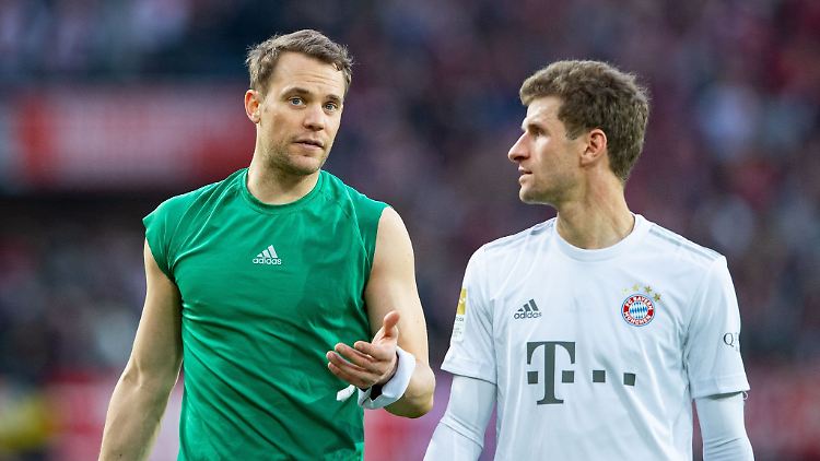 Bayerns Manuel Neuer (l) und Thomas Müller.