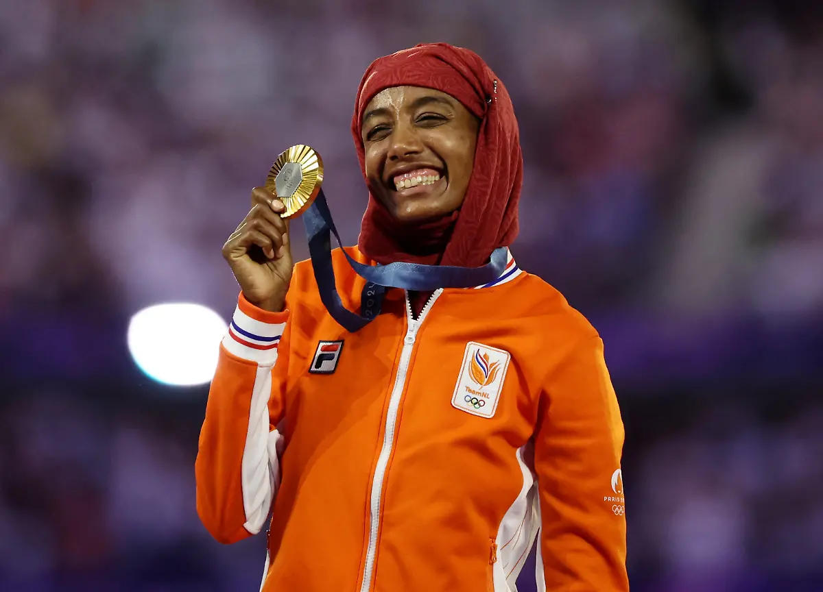 2024-08-11T200359Z-1670724759-UP1EK8B1JQM2A-RTRMADP-3-OLYMPICS-2024-ATHLETICS