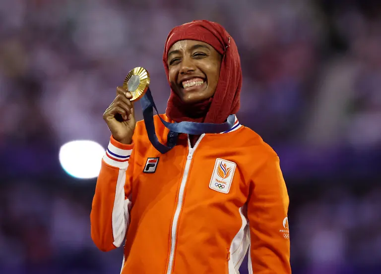 2024-08-11T200359Z-1670724759-UP1EK8B1JQM2A-RTRMADP-3-OLYMPICS-2024-ATHLETICS