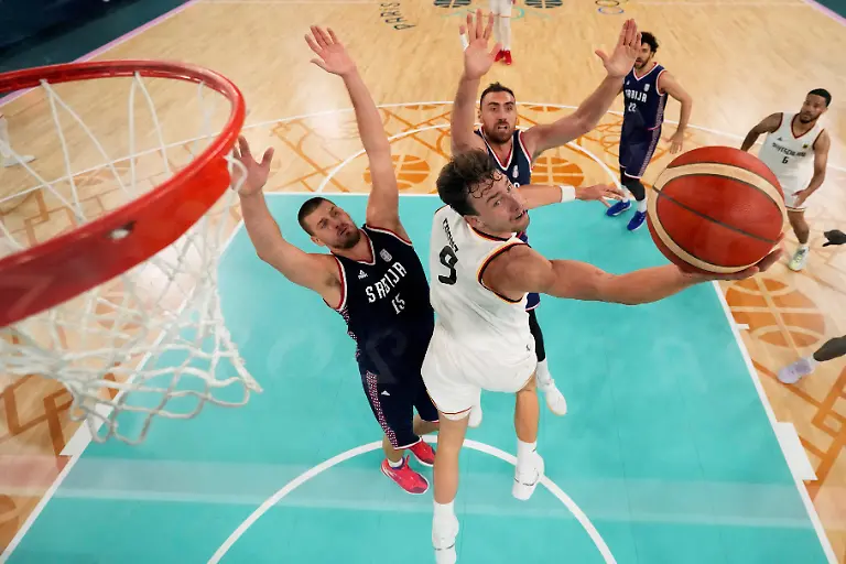 2024-08-10T134435Z-1841476251-UP1EK8A0WK027-RTRMADP-3-OLYMPICS-2024-BASKETBALL