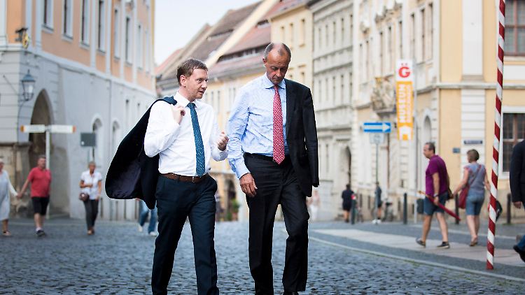 "Es gibt verschiedene Meinungen", kommentiert CDU-Chef Merz die Ausführungen von Ministerpräsident Kretschmer.