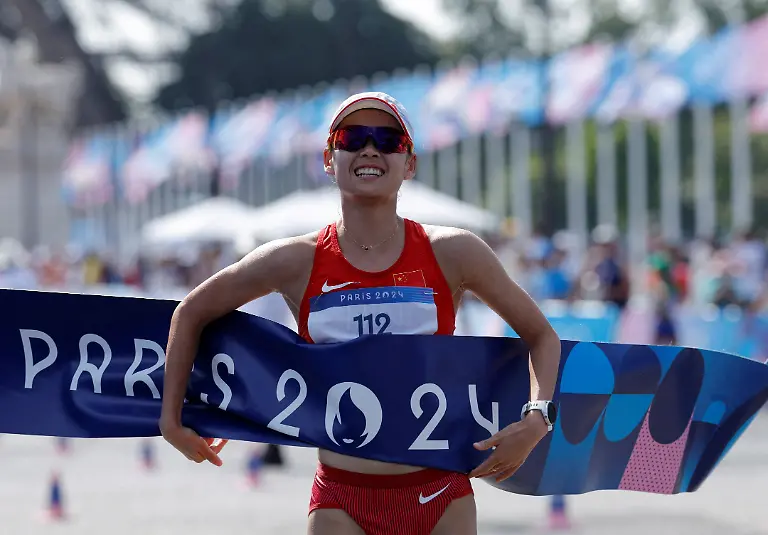 2024-08-01T100229Z-1165415367-UP1EK810QBILY-RTRMADP-3-OLYMPICS-2024-ATHLETICS