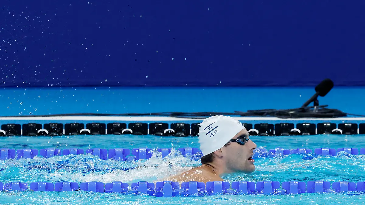 2024-07-24T115630Z-932581358-UP1EK7O0X64DX-RTRMADP-3-OLYMPICS-2024-SWIMMING
