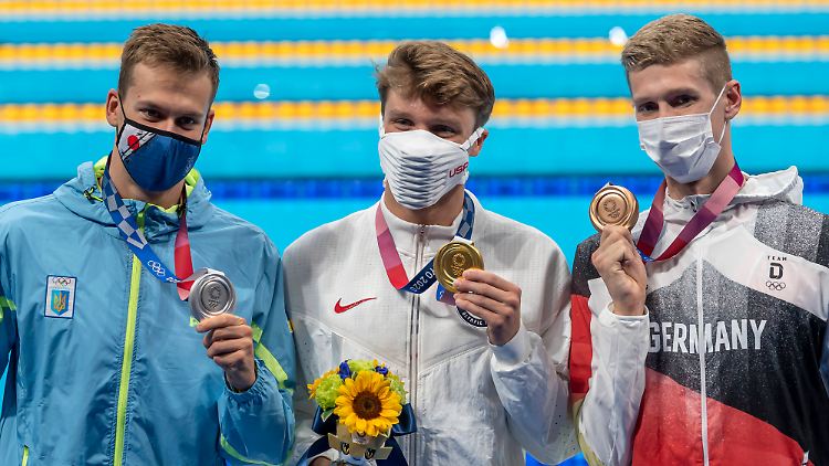 Michailo Romantschuk (links) und Florian Wellbrock (rechts) standen in Tokio gemeinsam auf dem olympischen Podium.