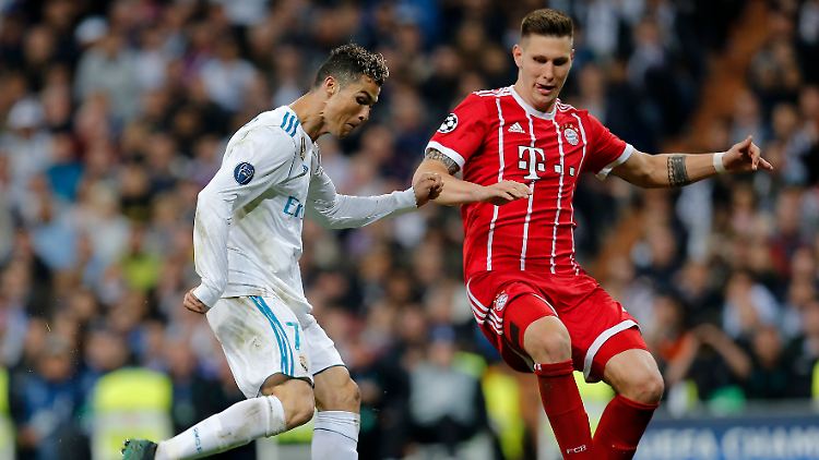 Cristiano Ronaldo (l.) im Trikot von Real Madrid. Spielt er im nächsten Jahr wieder gegen Niklas Süle (r.), der nun Dortmunder ist?