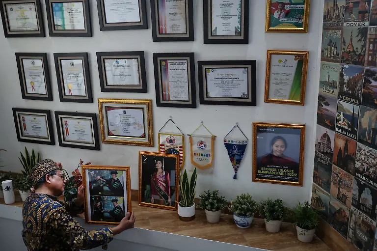 2024-06-13T230044Z-1147867904-RC2868ADRXZV-RTRMADP-3-OLYMPICS-2024-GYMNASTICS-INDONESIA