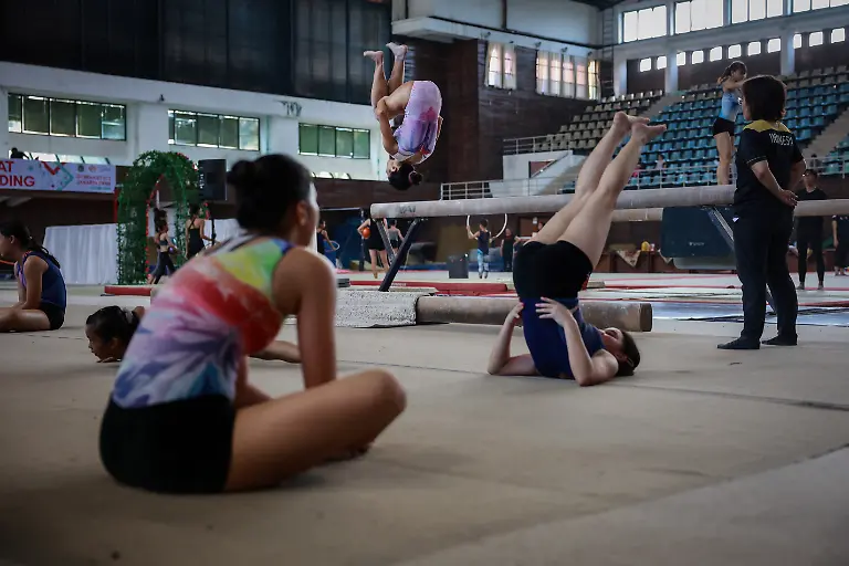 2024-06-13T230037Z-2105317959-RC29I7A1I8ET-RTRMADP-3-OLYMPICS-2024-GYMNASTICS-INDONESIA